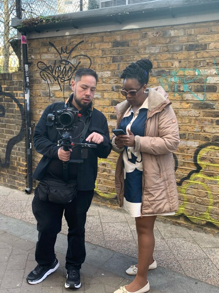 Ken Chu showing video playback to a client
